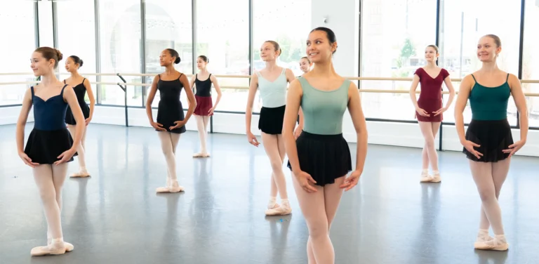 Several. young dancers in rows during Junior Summer Intensive.